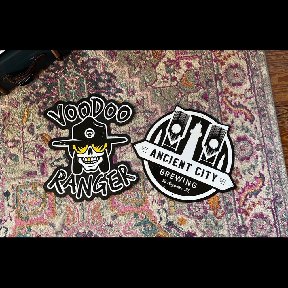 Two metal signs